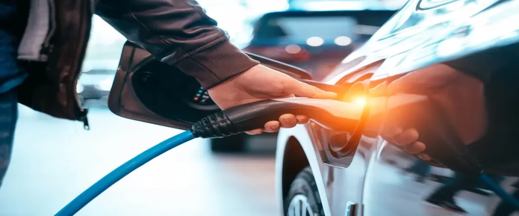 Electric car charging hand